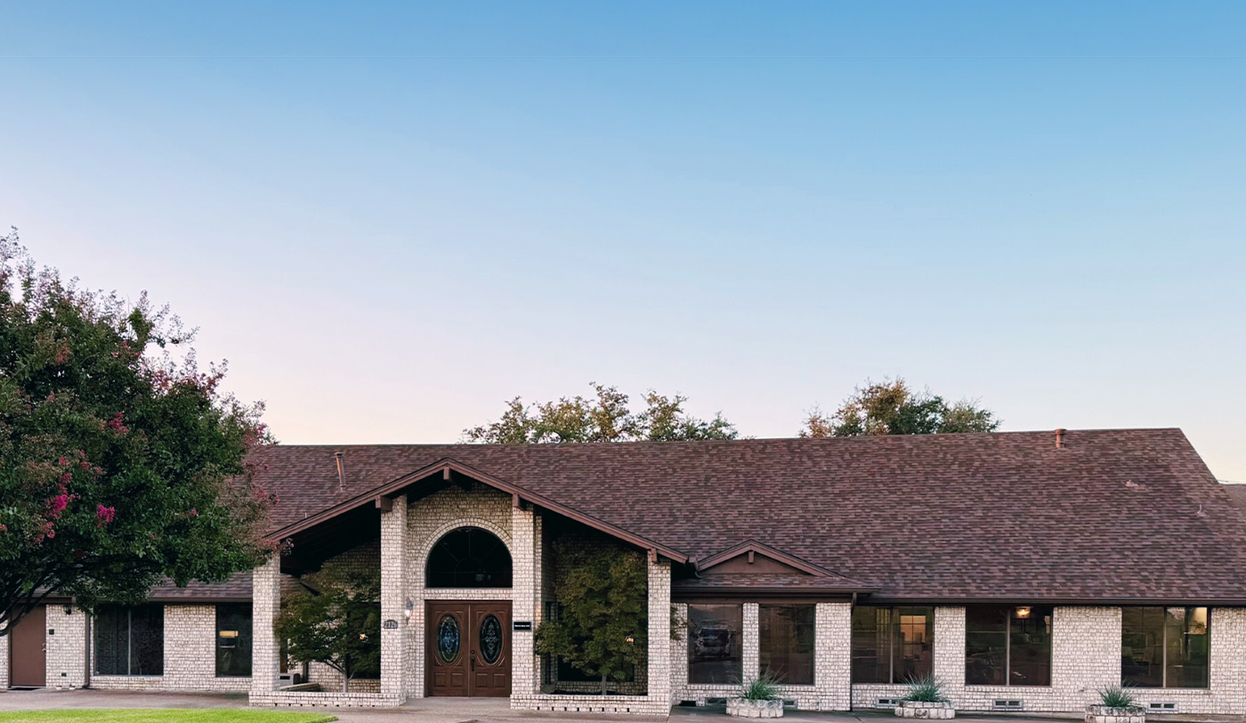 Cloudless blue sky above The Dental Place in Grand Prairie